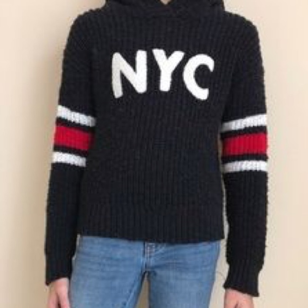 NYC black sweater with red and white stripes